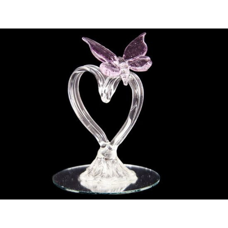 vlinder op hart van glas